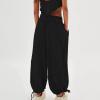 Baggy Harem Pants Women Drawstring Elastic Waist Wide Leg Hippie Beach Pants Relaxed Fit Lounge Pants with Pockets Black view 4