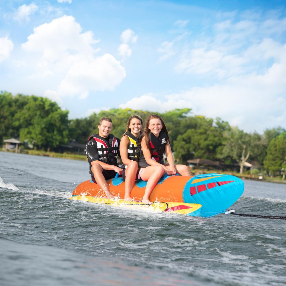 GYMAX Hot Dog Towable, 2/3 Riders Towable Tube for Boating with EVA Seat Pads, Easy Grip Handles, Full 900D Nylon Cover & Drainage System, Inflatable Floating Banana Boat (3 Persons)