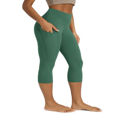 ODODOS Women's High Waisted Yoga Capris with Pockets,Tummy Control Non See Through Workout Sports Running Capri Leggings, Dark Green, Large