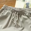 QOAAIE 1/2/3 Packs Men's Running Athletic Shorts Drawstring Workout Gym Shorts with Pockets Summer Casual Beach Shorts (Apricot/Grey,3XL) view 4