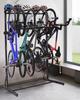 GULIMENG Freestanding Bike Rack Storage - Vertical Bike Stand Max 5 Bikes with Helmet Holders, Heavy-Duty Solid Steel Bicycle Stand Indoor Garage Floor Stand for Home & Garage& Bike Park view 1