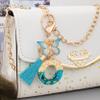 Suweibuke Cute Pink Key Chains for Women Girls, Initial Letter Keychains with Tassel, Charms for Key Purse Handbags Backpacks (Blue Ocean-O) view 3