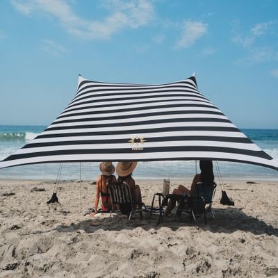 Neso Grande Portable Beach Tent Sun Shelter - Lightweight Beach Shade Canopy - Easy Setup for Family Outings - Patented Reinforced Corners - UPF 50+ - 7ft Tall, 9 x 9ft - Black/White Stripes